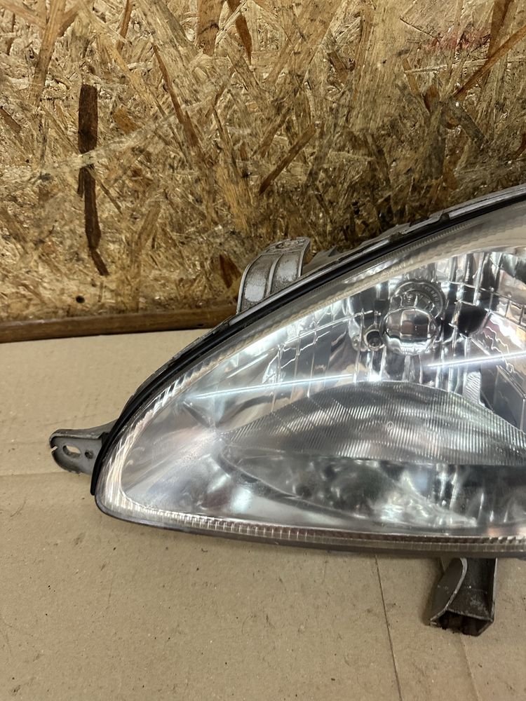 Передня ліва фара Chevrolet Tacuma Шевроле Такума Daewoo Rezzo 04-08