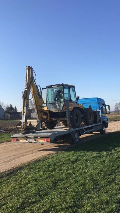 POMOC DROGOWA Holowanie Transport busów ciągników AUTOLAWETA