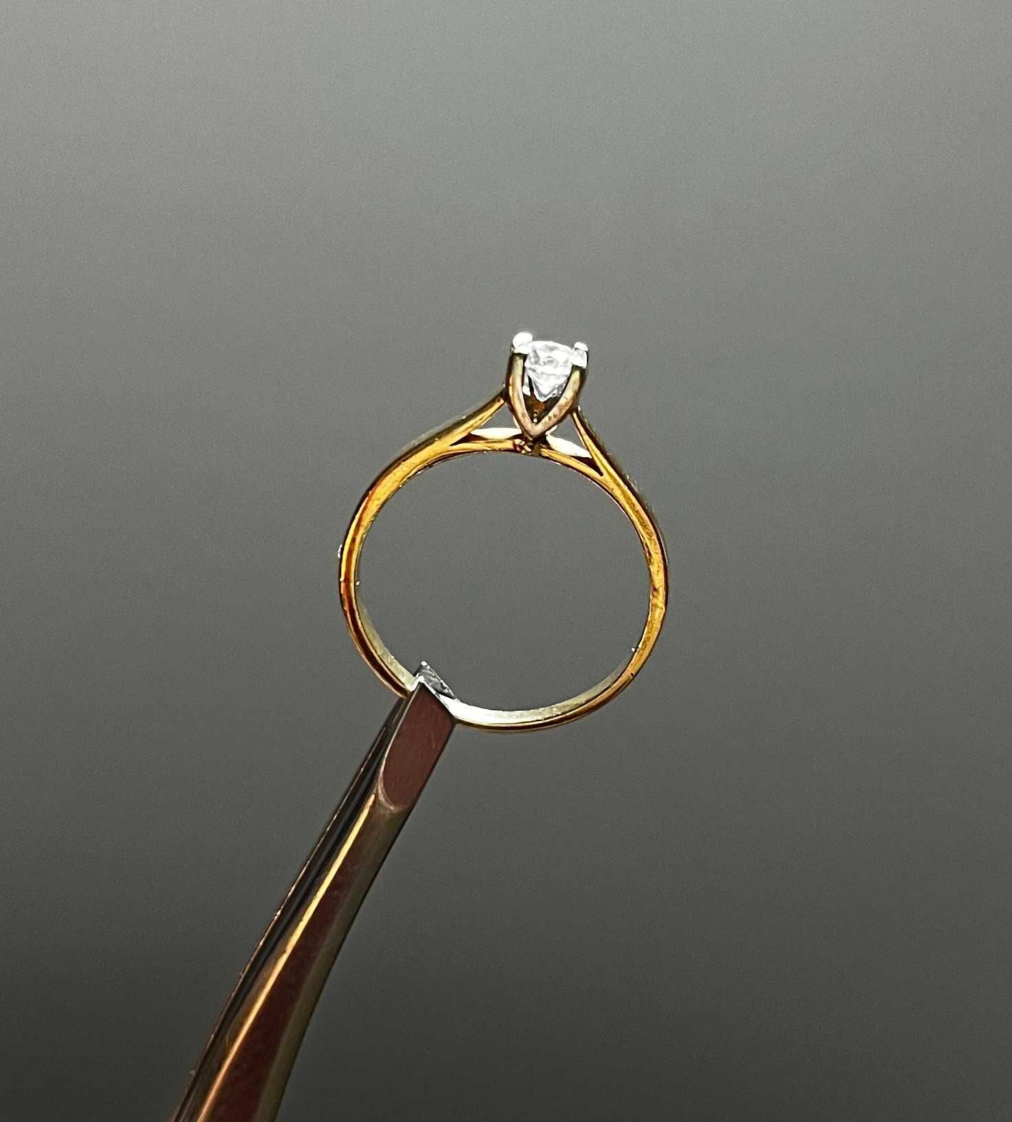 Pierścionek zaręczynowy złoty p.585 z diamentem 0,20 ct