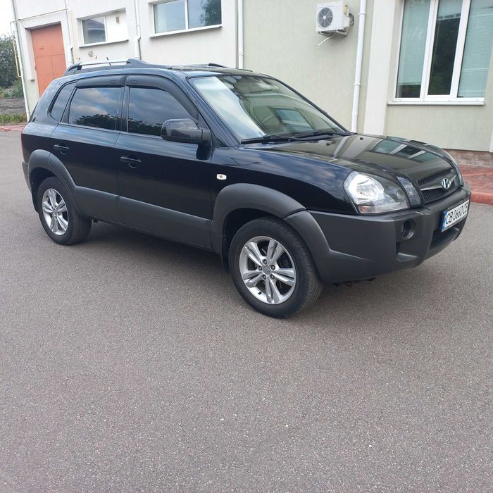Hyundai Tucson, I покоління  2.0 DOHC МТ (142 к.с.) 4WD  Base