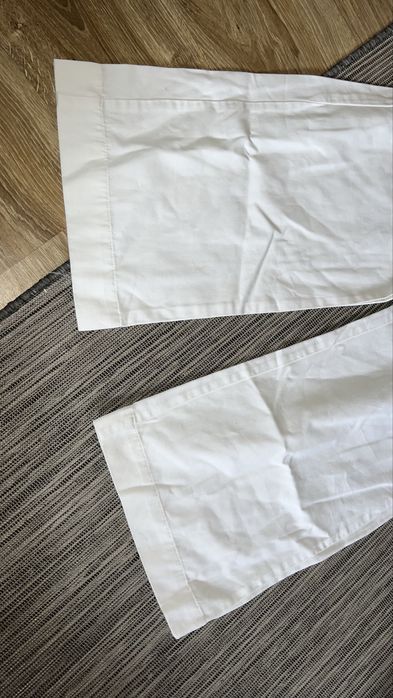 Białe letnie spodnie o bardzo szerokich nogawkach X S 34