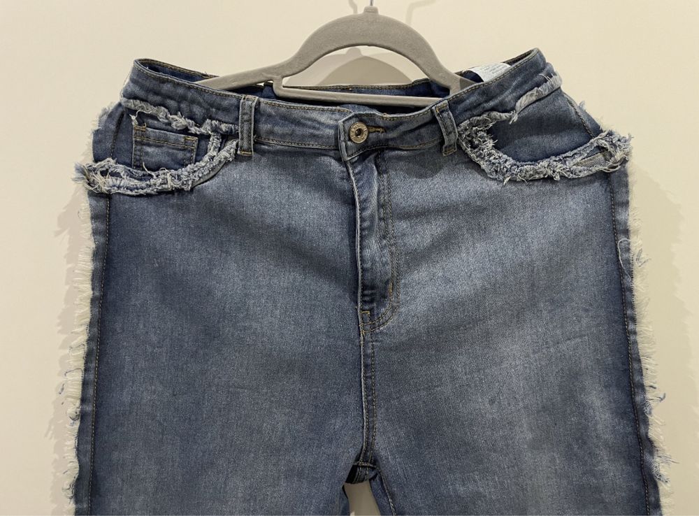 Spodnie jeansowe jeansy dżinsy dwukolorowe oryginalne szarpane L
