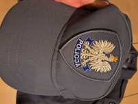Policja olimpijka i czapka mundur bluza