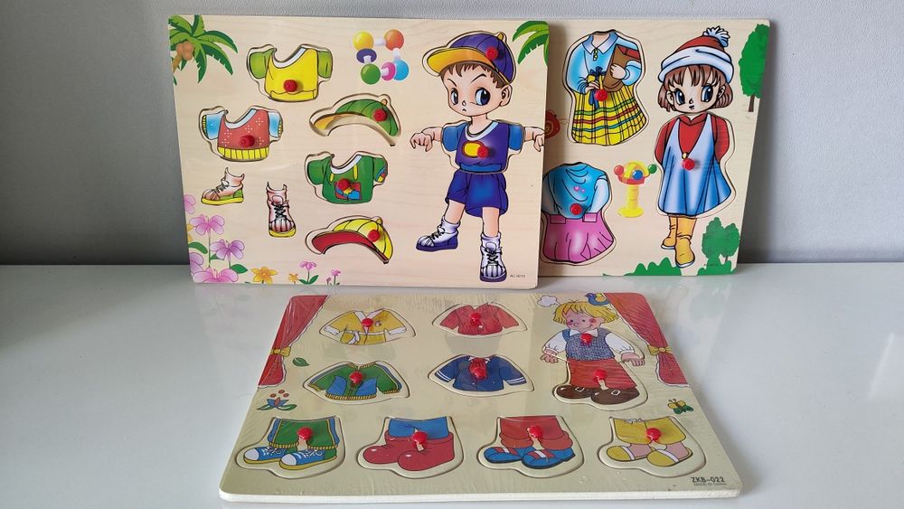 Дерев'яні іграшки пазли і вкладиші, вставки.