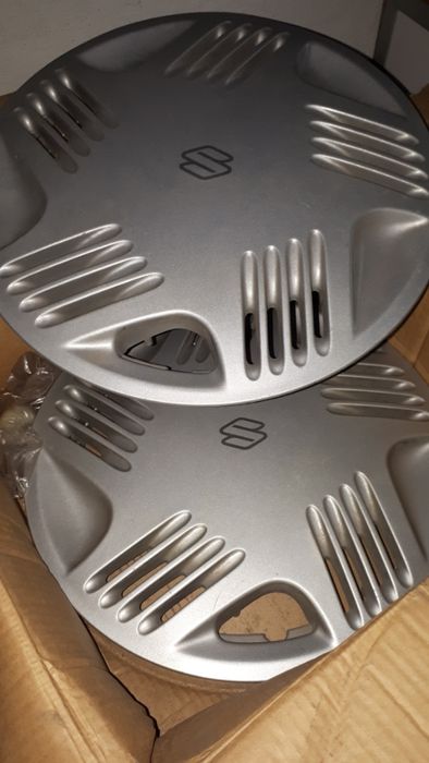 2 tampões Suzuki jante 14