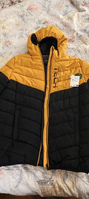 Vendo casaco novo  de criança da C&A