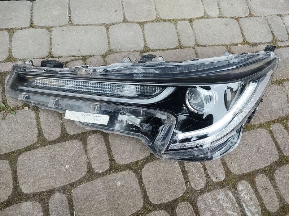 Reflektor lewy Toyota Corolla