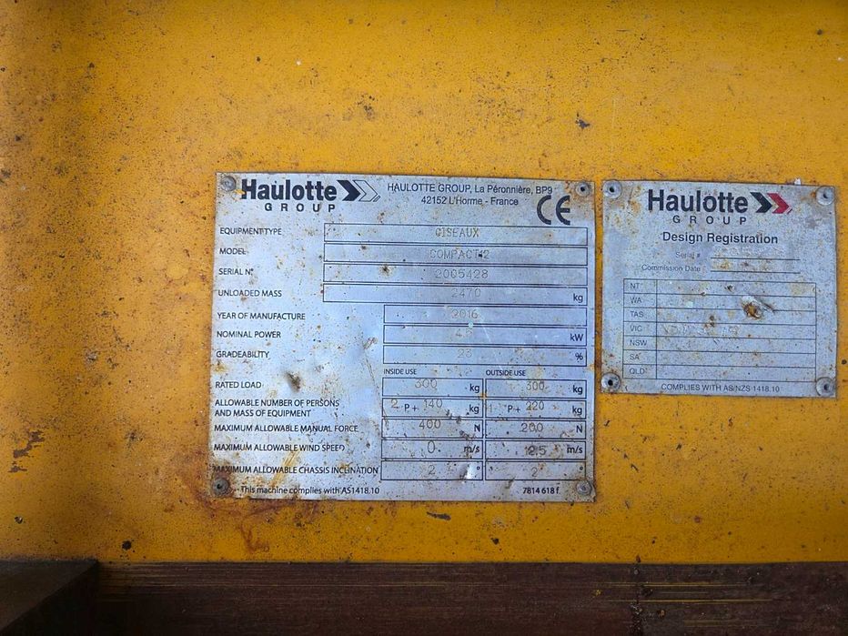 Ножничний підйомник Haulotte Compact 12, акамуляторний, пеканіска