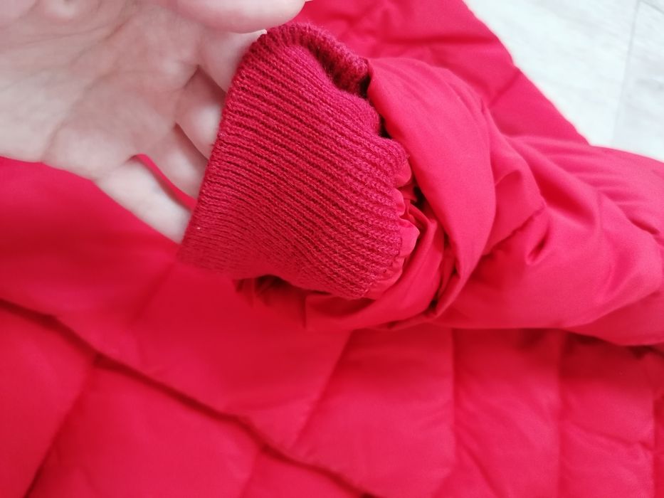 Пуховик S з мехом єнота