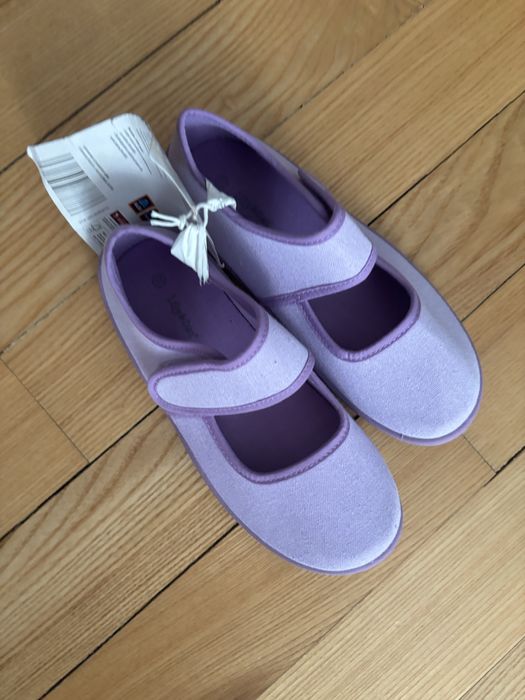 Тапочки нові у школу