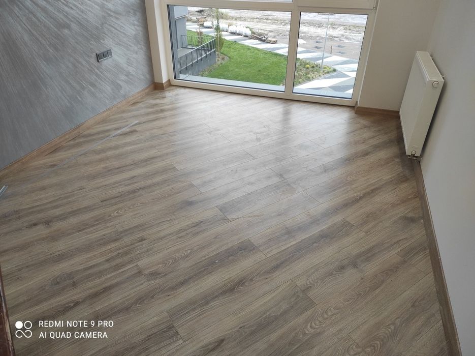 Монтаж плінтуса та ламінату Львів !  Укладка  ламінату МДФ