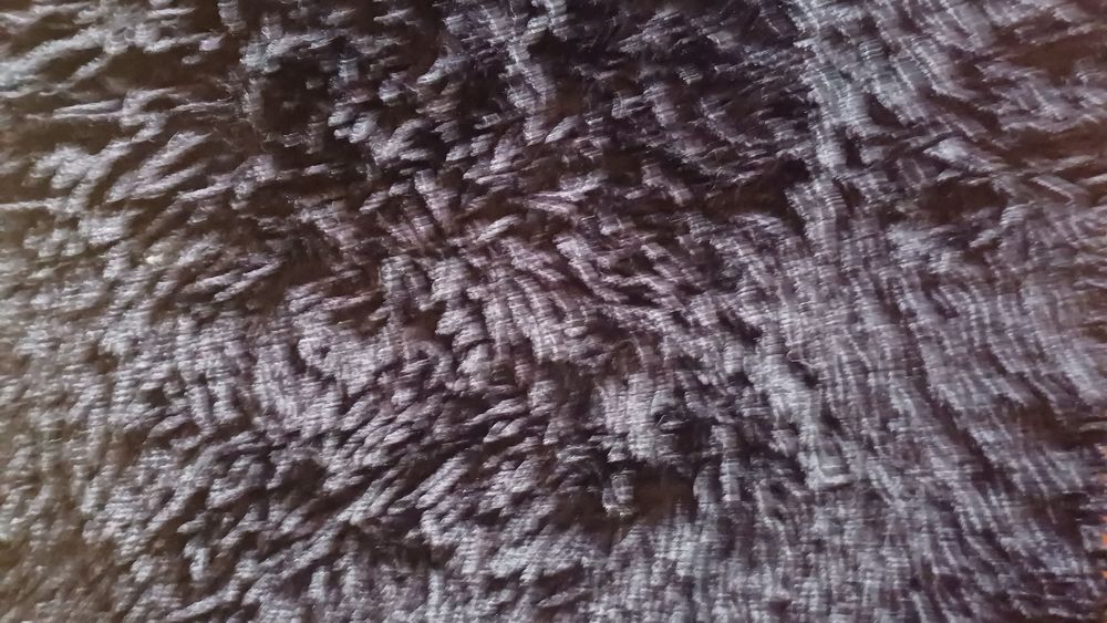 Tapete retangular em preto