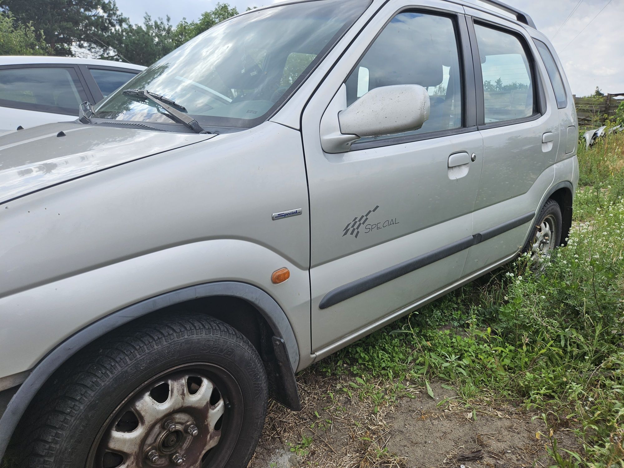 Suzuki Ignis zderzak maska lampa drzwi blotnik klapa koła pas 02r