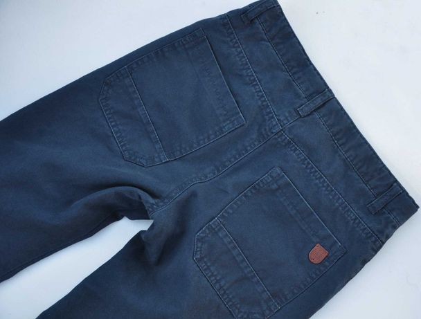 RESERVED spodnie granatowe jeansy na podszewce r 134