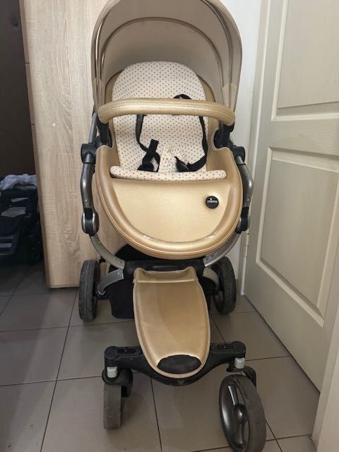 Продам коляску mima золотого кольору.
