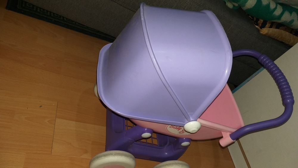 Детская игрушечная коляска