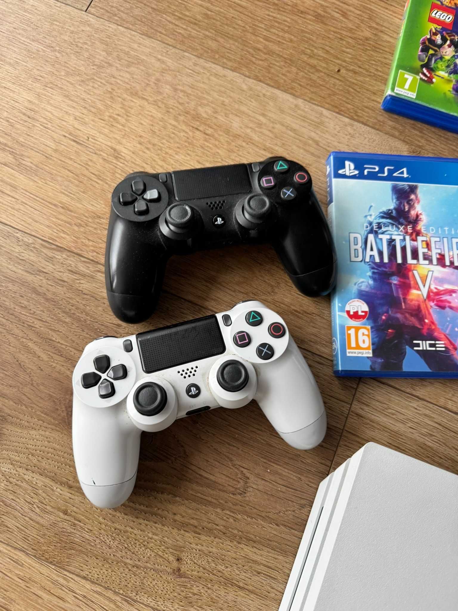 PS4 PRO biała, NOWY dysk SSD 1 TB + 7 GIER i 2 PADY - SUPER OKAZJA !!!