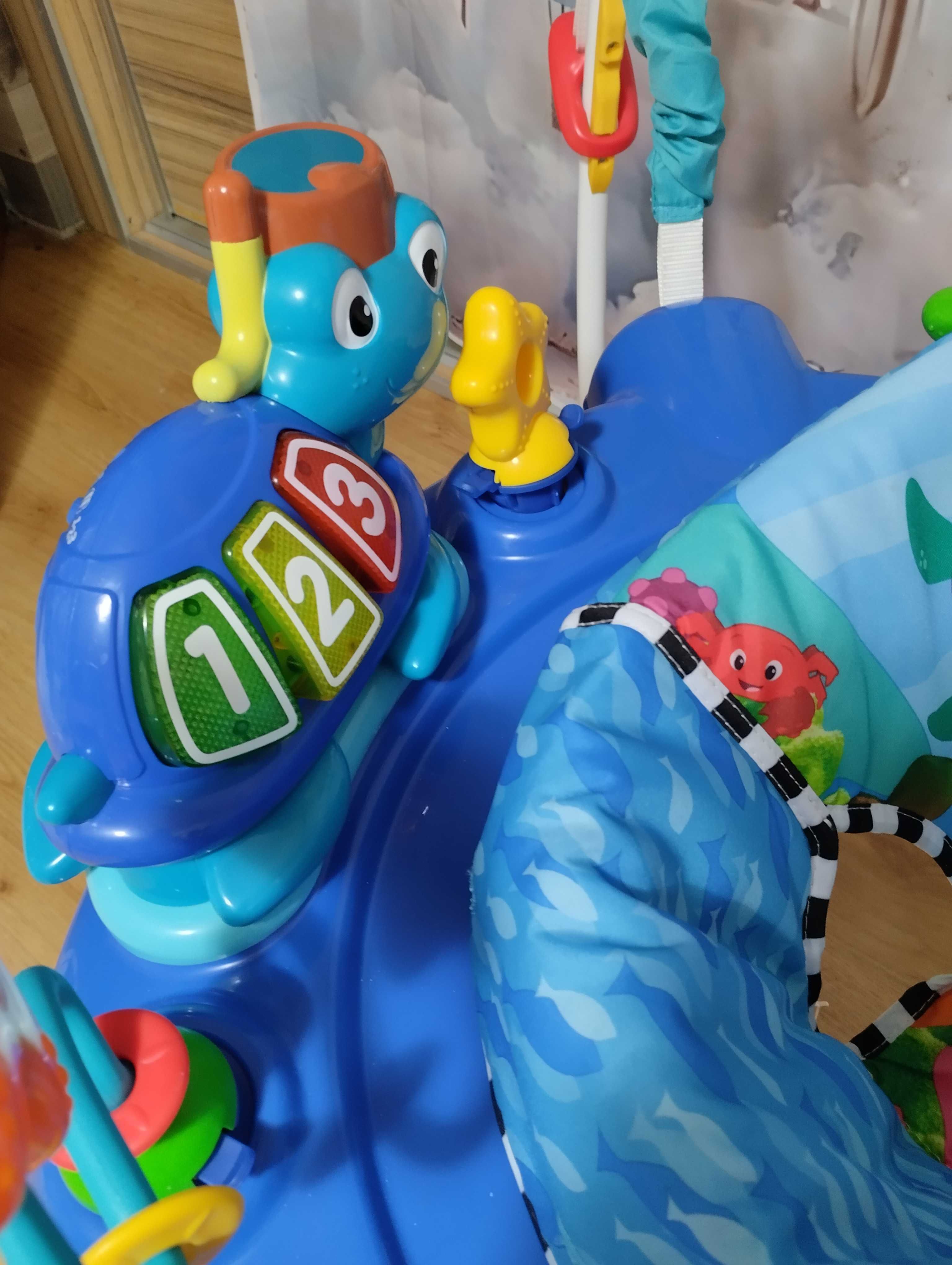 Skoczek interaktywny Baby Einstein Neptune Ocean stolik edukacyjny 360