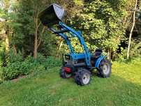 Ogrodniczy ISEKI TX1300 z Łyżką