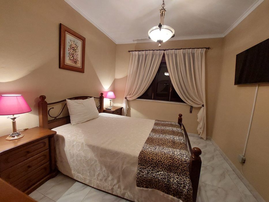 Quarto aconchegante para uma pessoa