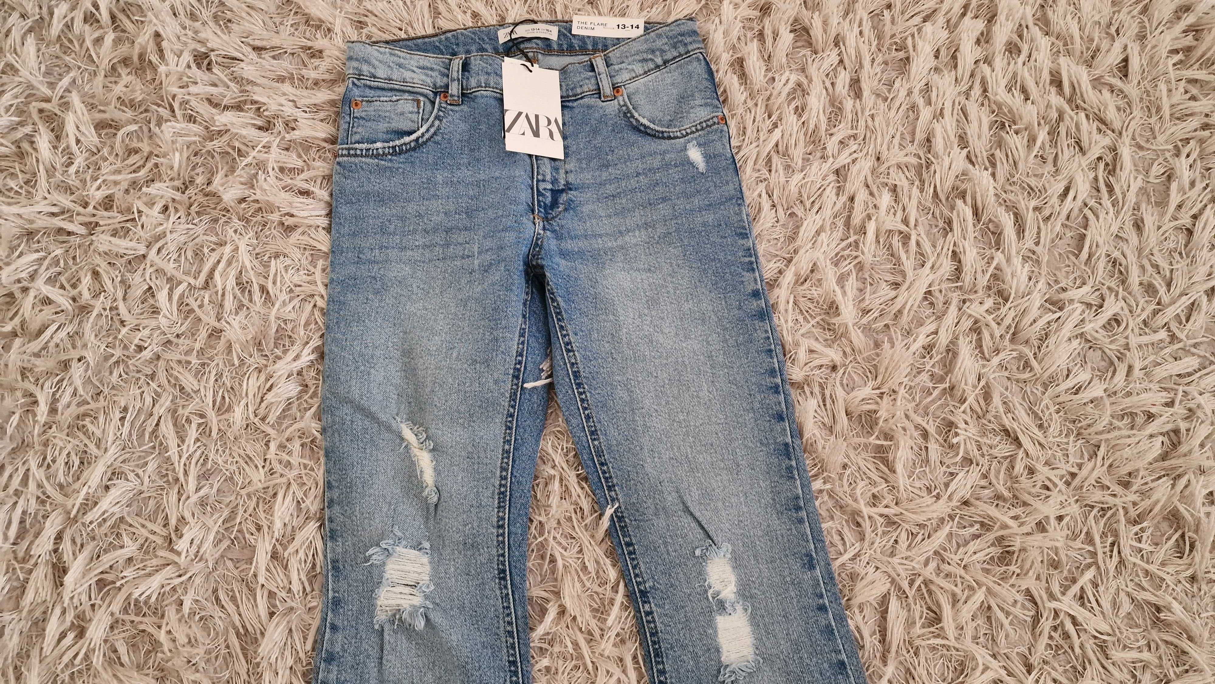 Zara spodnie jeansy flare z przetarciami / rozdarciami 164 cm zara