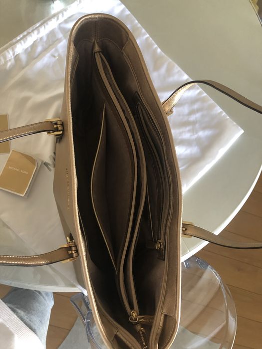 Mala michael kors dourada