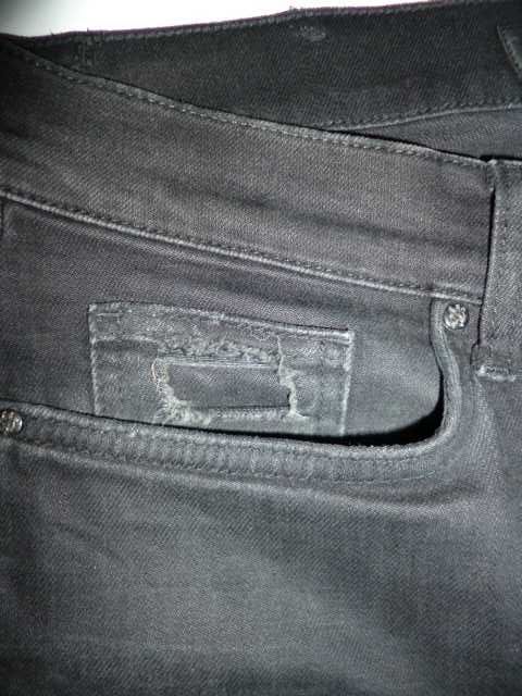 Tigha spodnie męskie czarne z dziurami rozm.30/34,- pas 86 cm
