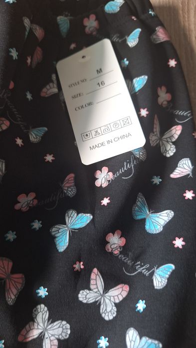 Leginsy ocieplane czarne z motylkami 152/158