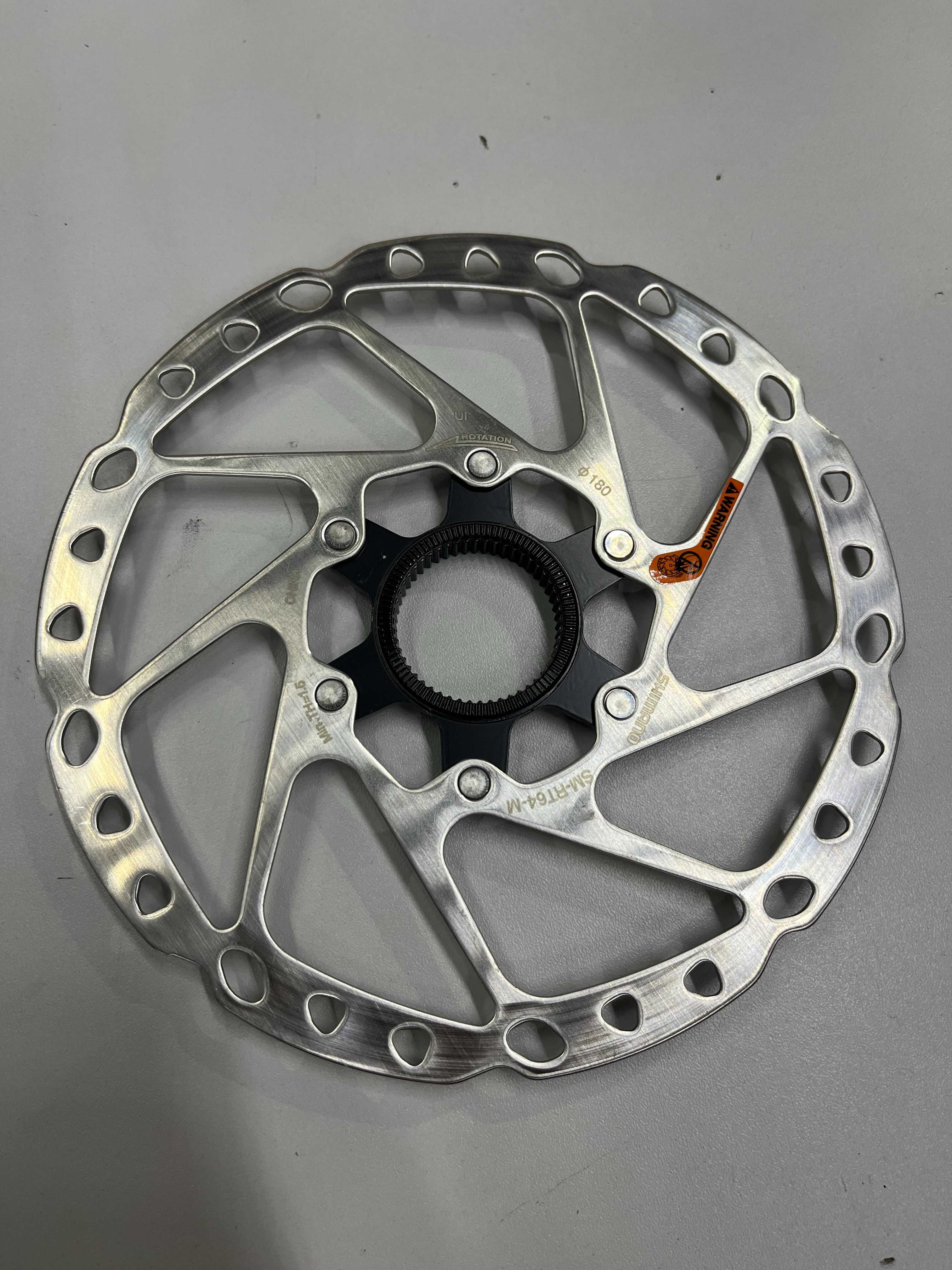 Tarcza hamulcowa Shimano RT-64 CENTERLOCK 180mm ZDJĘTA Z NOWEGO ROWERU