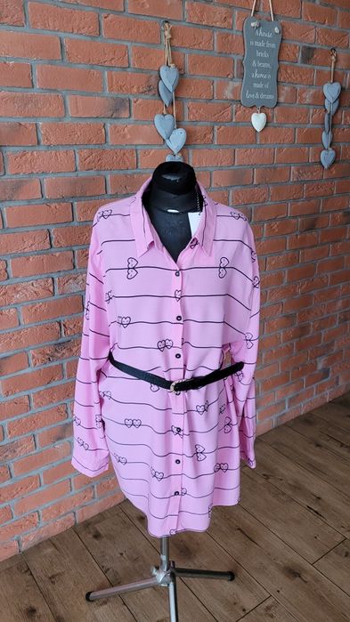 Koszula  model o luźnym oversize kroju długi rękawy duży roz
