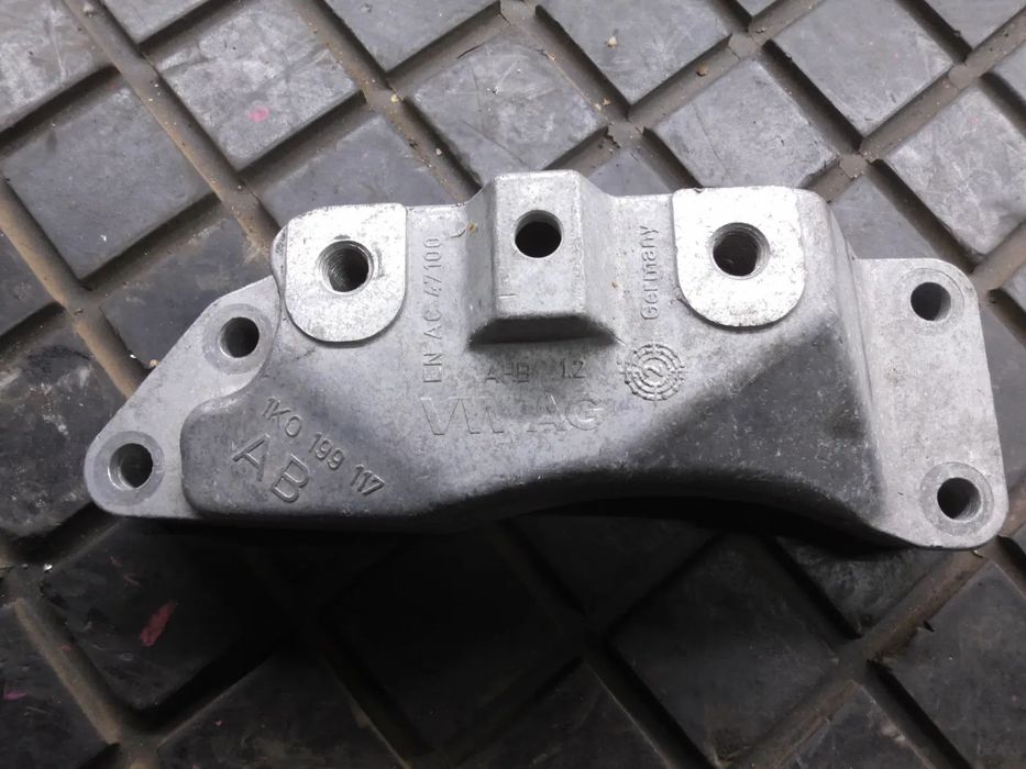 VW PASSAT B7 USA 1.8 TSI UCHWYT ŁAPA PODPORA SKRZYNI BIEGÓW 1K0199117AB