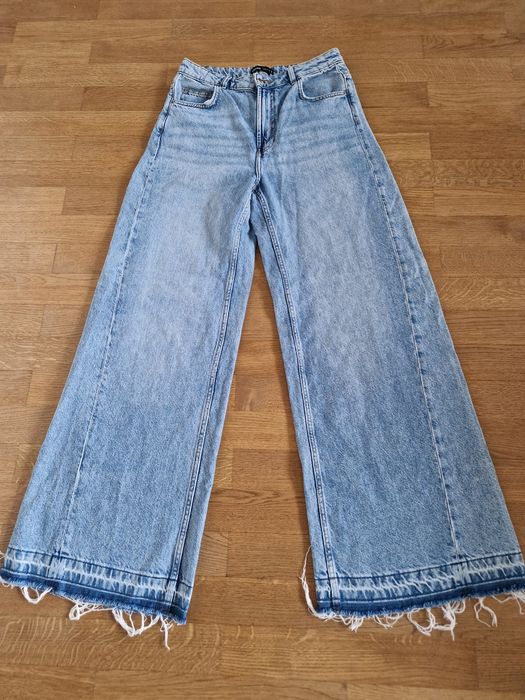 Spodnie jeansy dzwony flare wide leg Cropp M 38