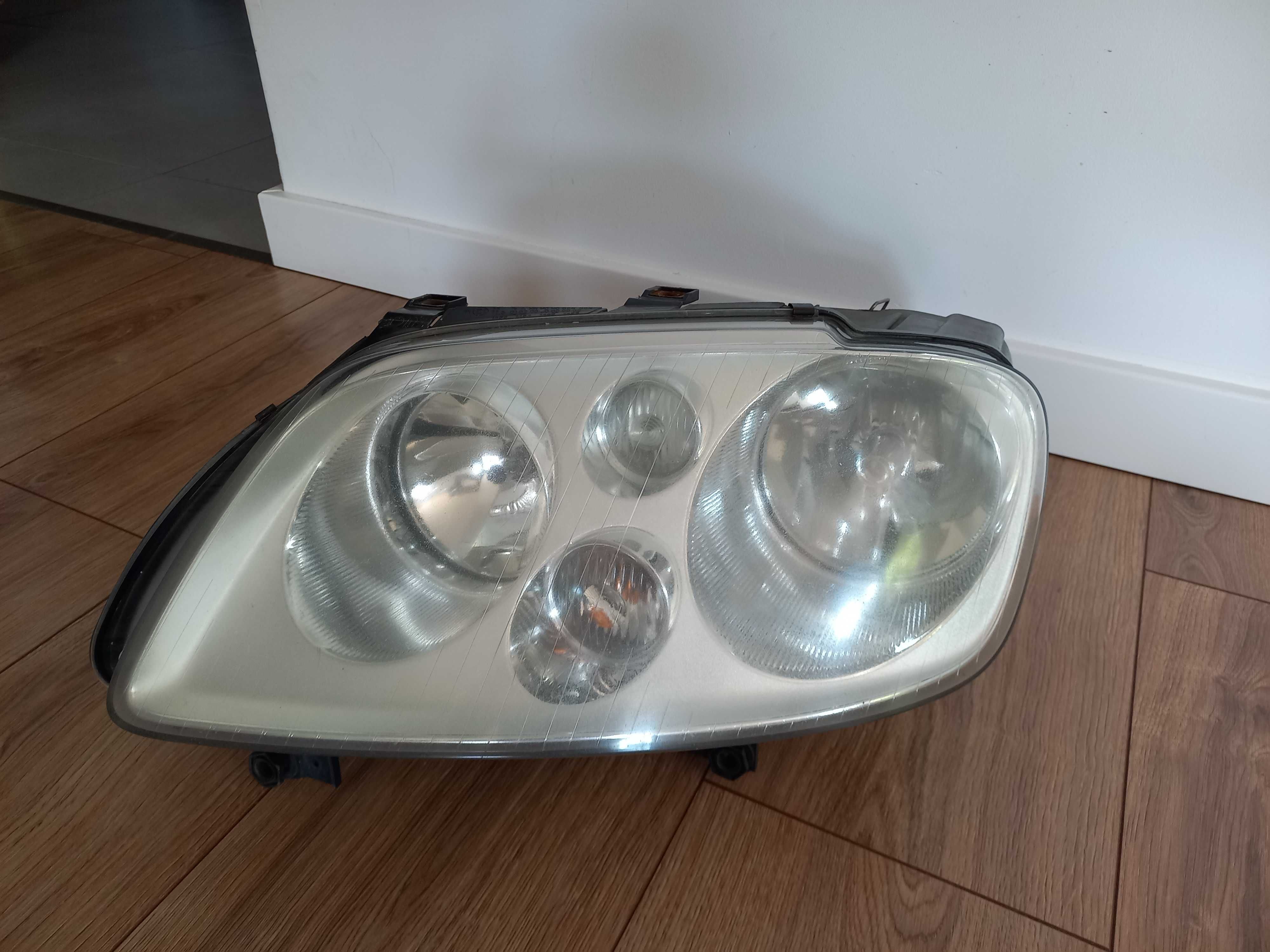 VW Touran lampa lewa przód 03-06 r