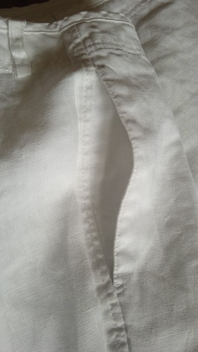 Білі широкі льняні брюки. we