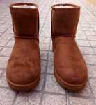 Botas pantufas com pêlo castanhas