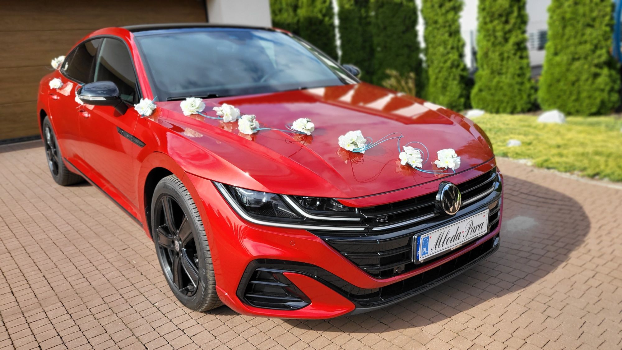 Auto do ślubu na wesele VW Arteon wynajem uroczystość czerwony