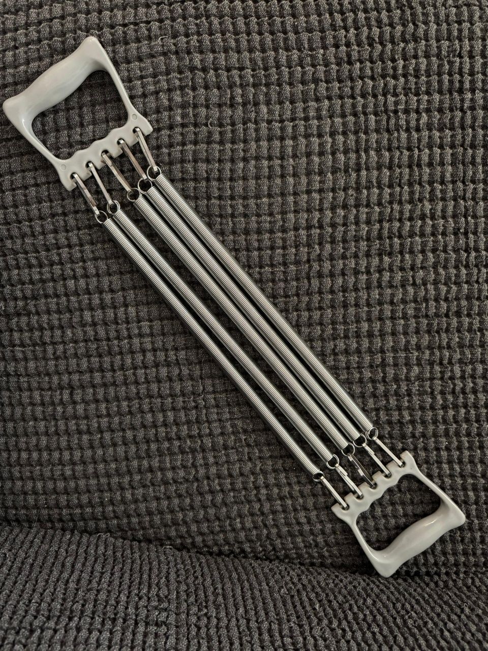 Extensor peitoral de 5 molas