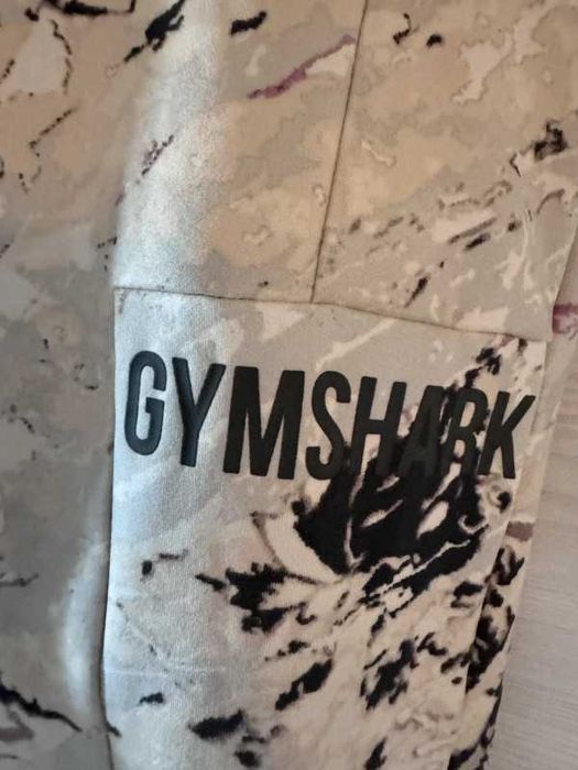 Białe marmurkowe legginsy gymshark S