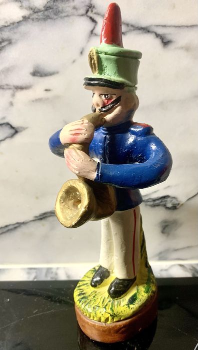 Estatueta de músico em terracota