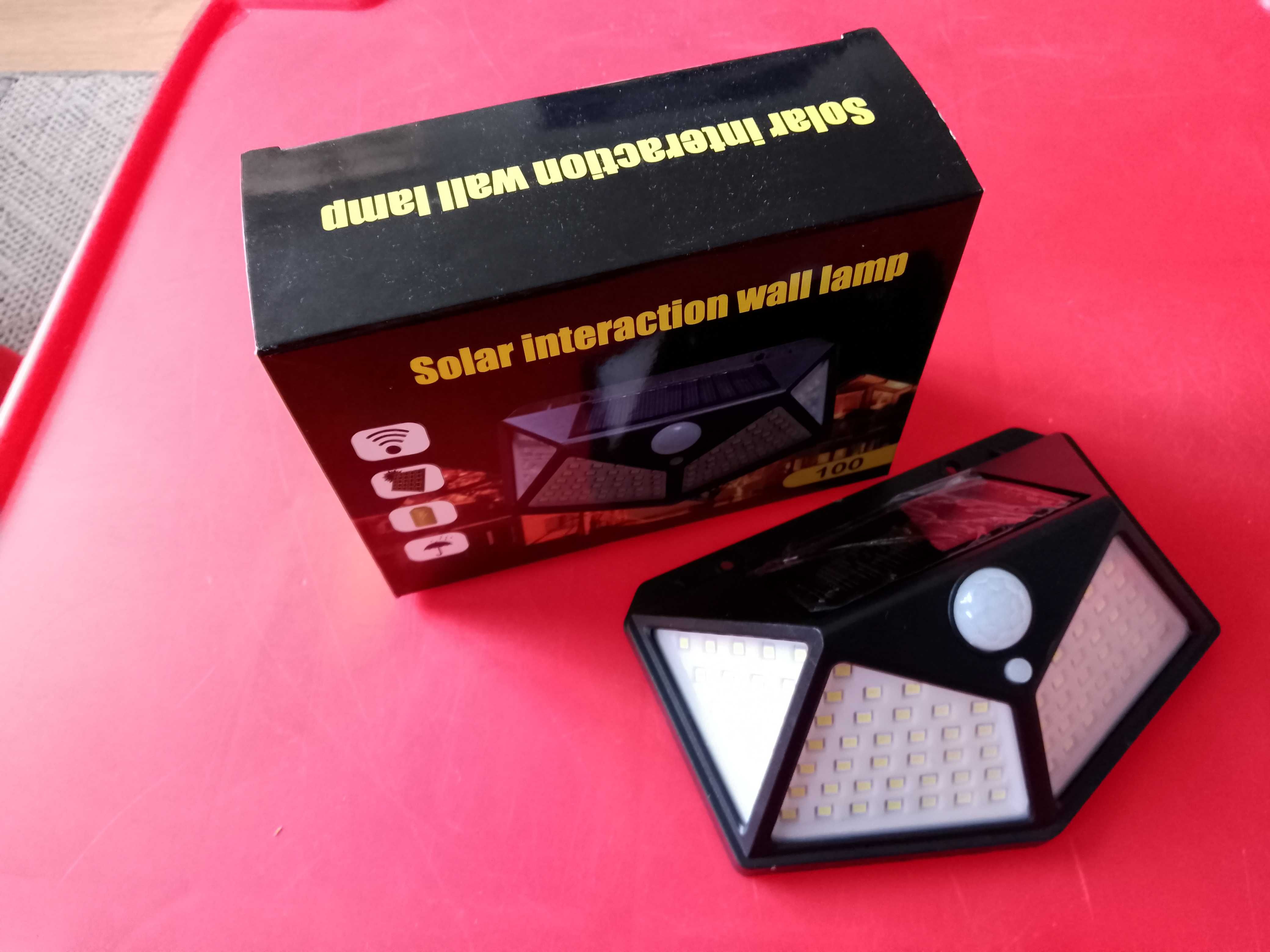 LAMPA SOLARNA 100 LED Z CZUJNIKIEM zmierzchu ruchu elewacyjna ogrodowa