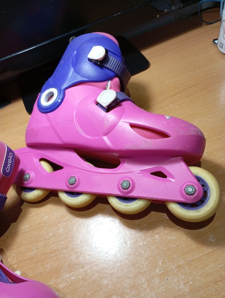 Patins em linha rosa