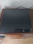 Playstation 3 + 2 comandos+4 jogos