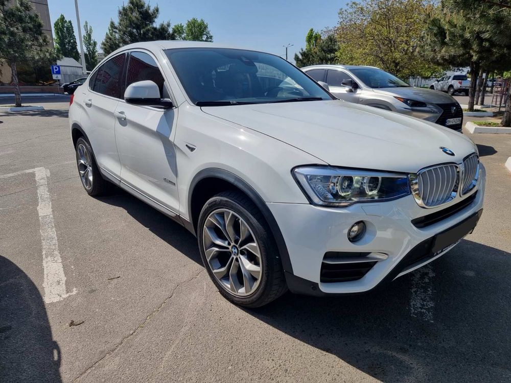 BMW X4 x drive.  .