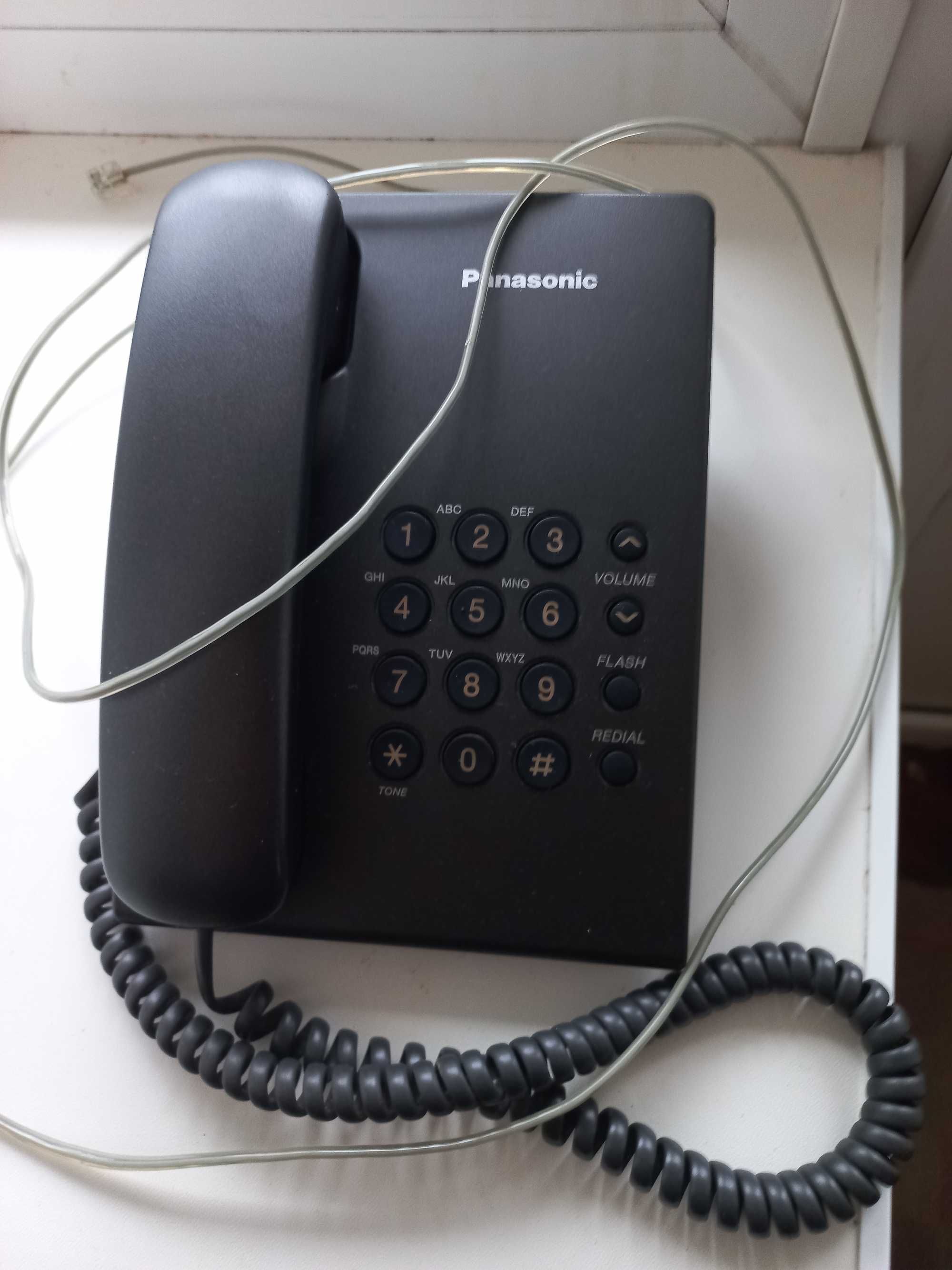 Стационарный телефон Panasonic.