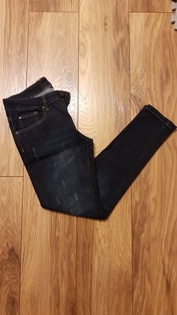 Granatowe jeansy Esmara