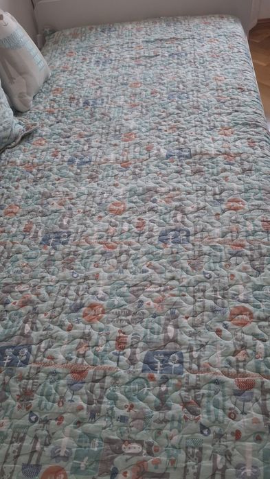 Colcha com almofadas