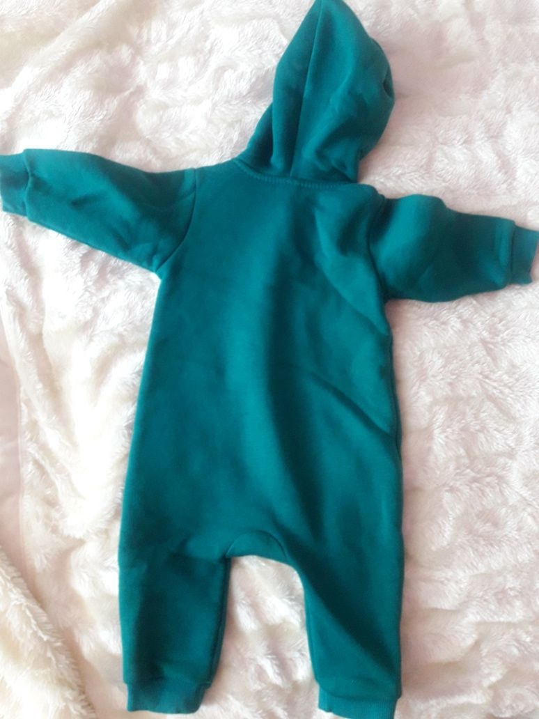 Комбінезон дитячий теплий з капюшоном зеленого кольору