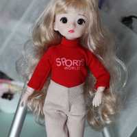 Лялька нова даже гарна з одягом новая с одной шарнирная кукла