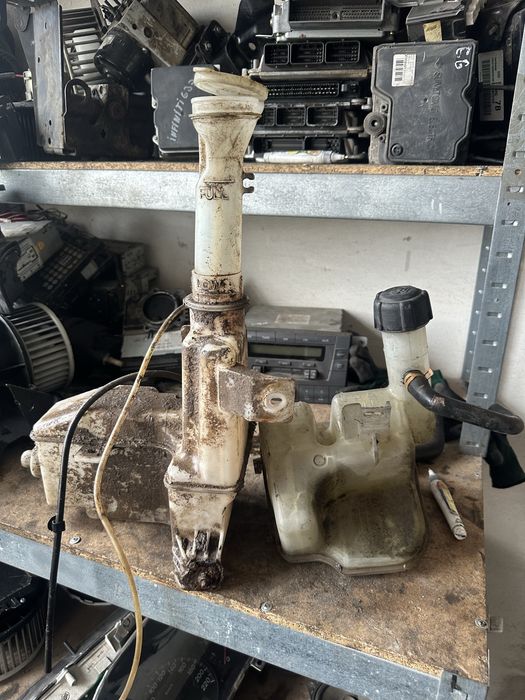 Бачек розширительный омывателя дача супер нова рено логан кенго