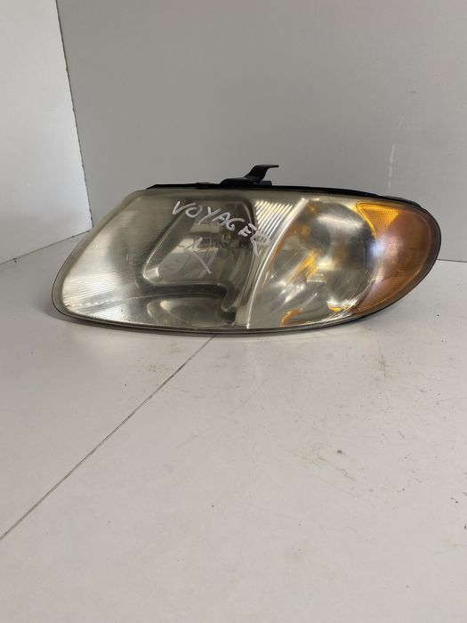 Lampa reflektor lewy przód CHRYSLER VOYAGER IV (00-05) EUROPA